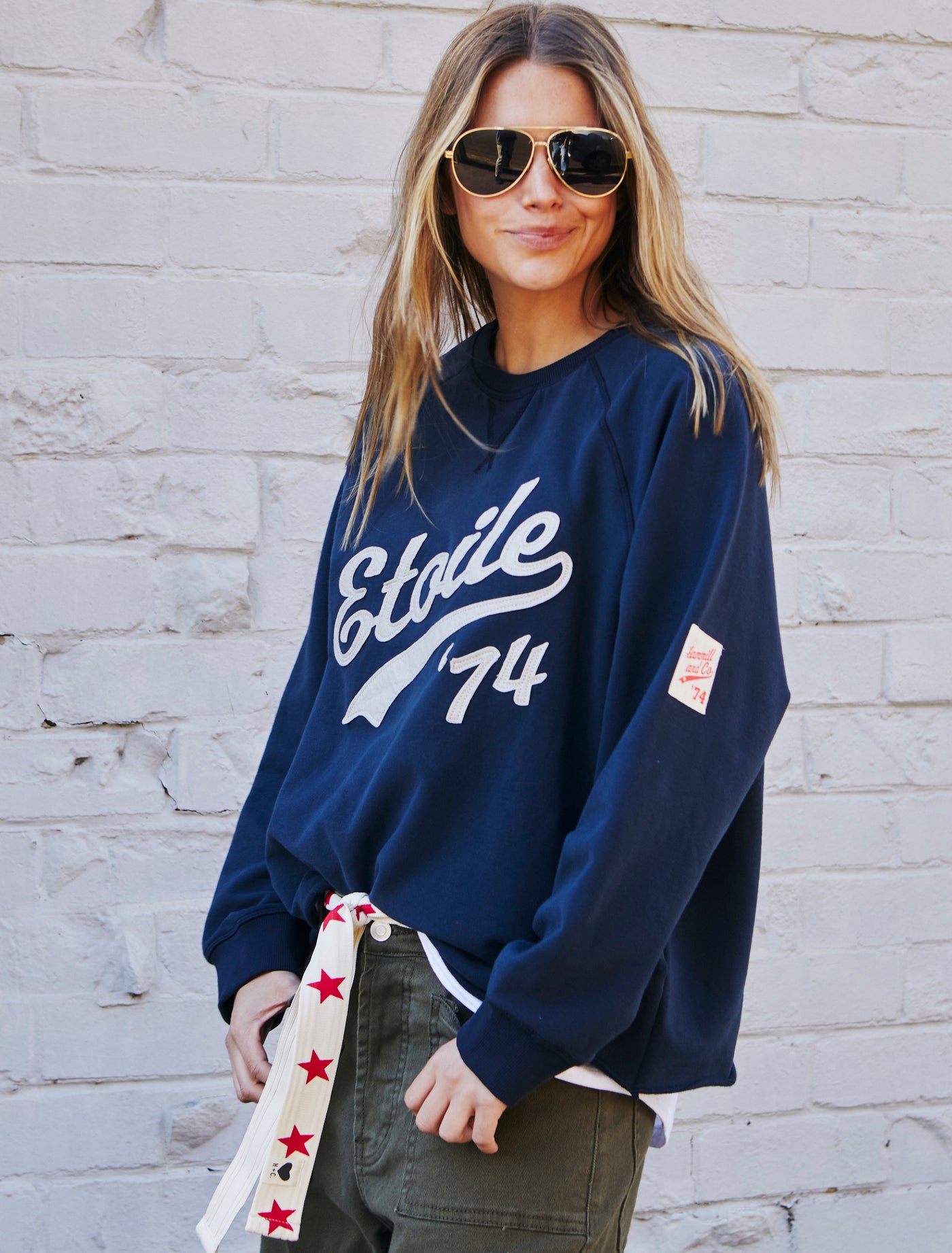 Hammill & Co New stretchy fabric sweat with beautiful brushed dark navy, fleecy on the inside. Features raw hem, raglan sleeve, Etoile '74 appliqué (Etoile is French for Star). A great fit and super comfy!