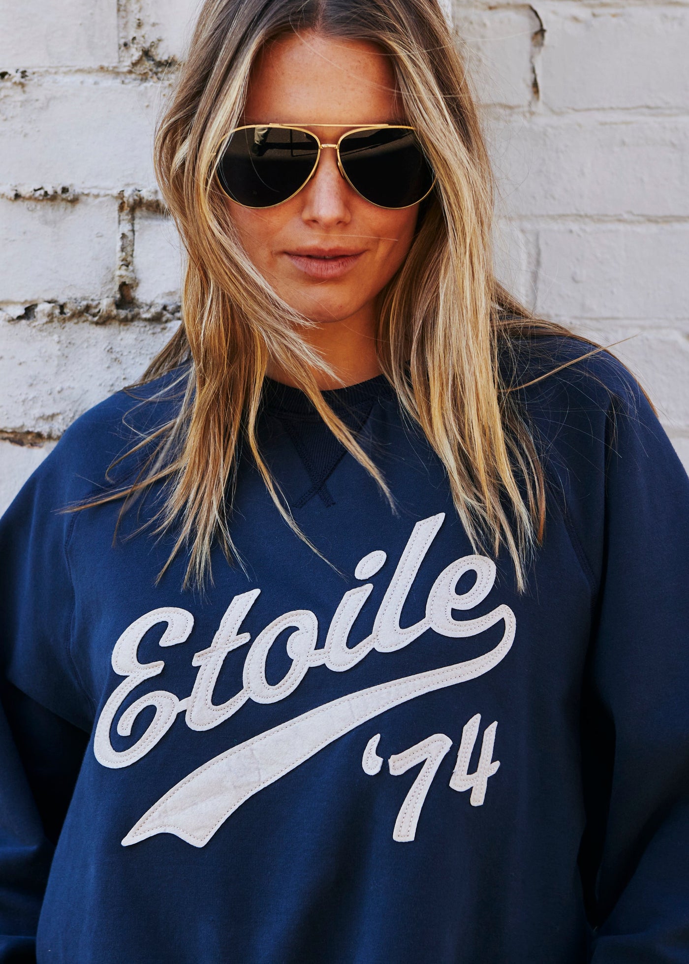 Hammill & Co New stretchy fabric sweat with beautiful brushed dark navy, fleecy on the inside. Features raw hem, raglan sleeve, Etoile '74 appliqué (Etoile is French for Star). A great fit and super comfy!