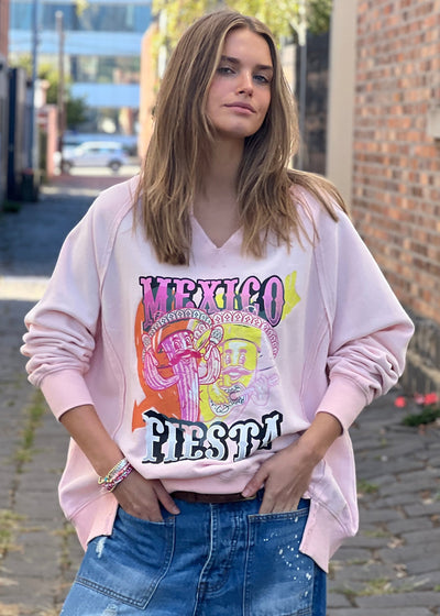 Hammill & Co oversized vintage wash sweat featuring raw cut v, exposed seams, wider rib waistband with side splits, raglan sleeve and new Mexican Fiesta print on the front and hand drawn logo on the back neck.
