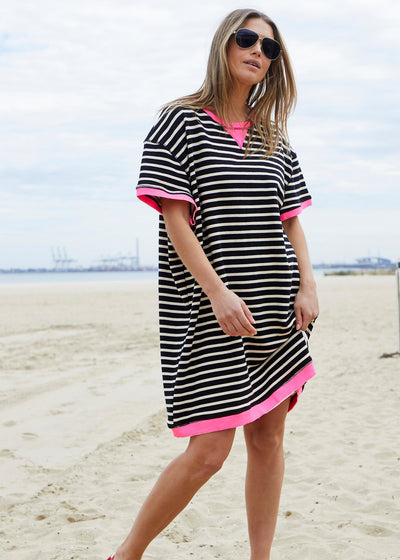 Hammill & Co This sporty beach dress is a relaxed, oversized striped tee-style dress designed for effortless coastal wear. I
