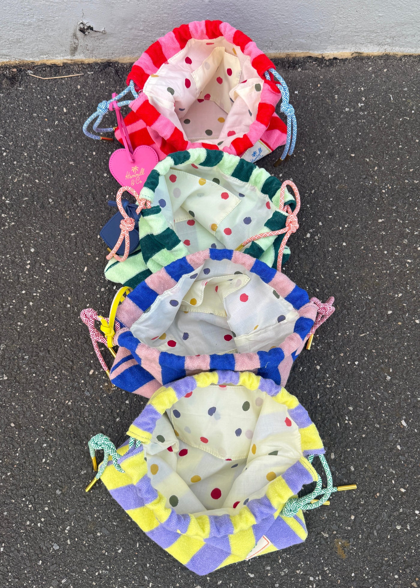 Hammill & Co adorable drawcord bag is bursting with colour and summer personality.