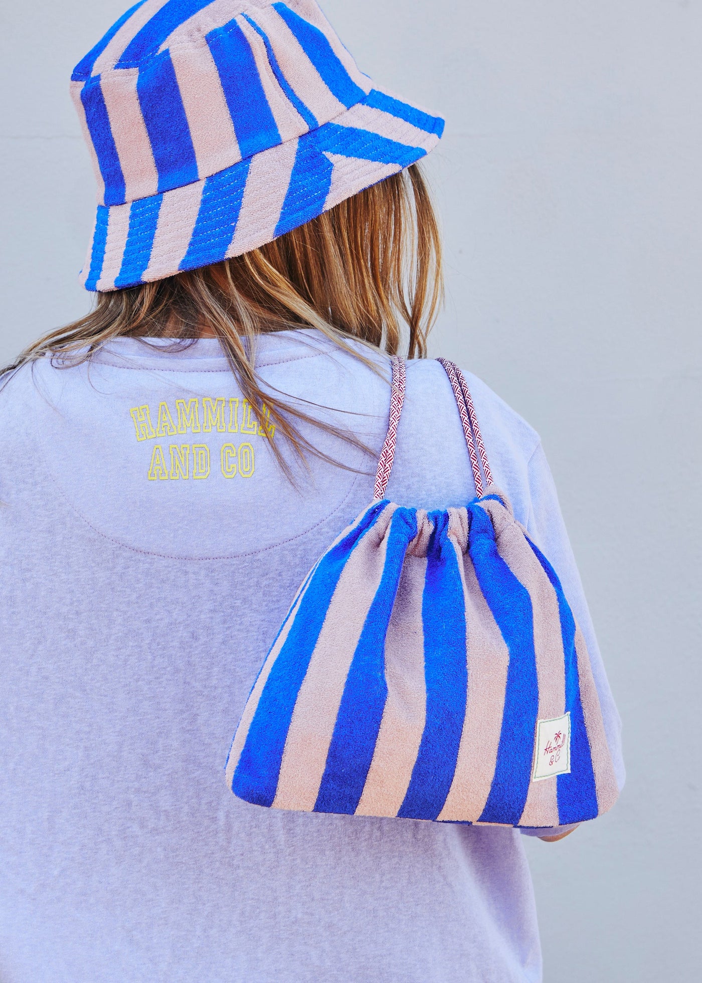 Hammill & Co adorable drawcord bag is bursting with colour and summer personality.