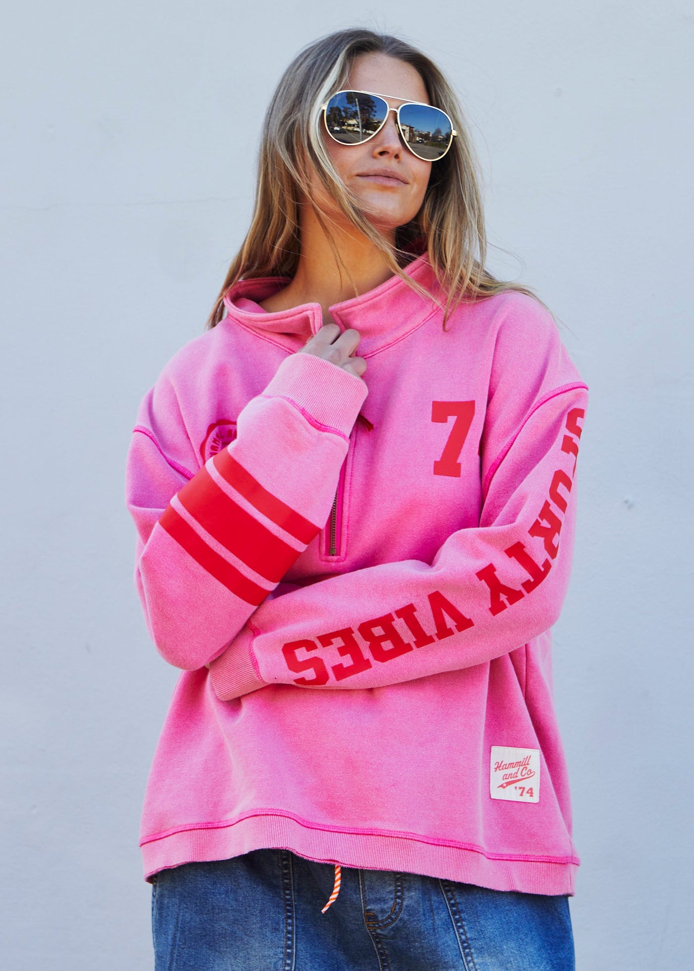 Hammill & Co Vintage wash is the feature of this sweat, soft, sun-fade tones in soft pink with highlight red print colours. Our newest best selling 1/2 zip style, which is slouchy, wider, long drop sleeves and relaxed waistband.